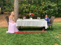 Seven-year-old Curtis Rogers, of Raleigh, North Carolina, created a social distance-style prom for his babysitter on Tuesday.