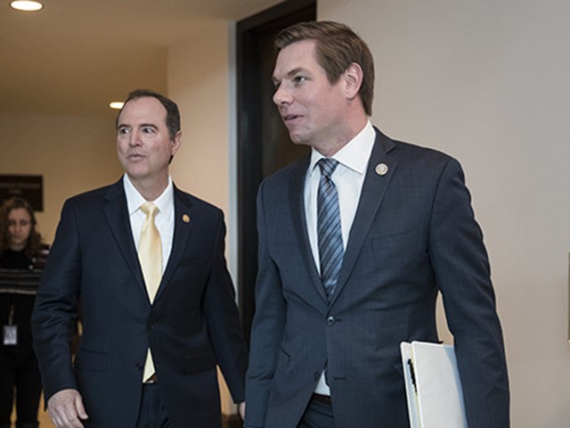 Rep. Adam Schiff, D-Calif., left, and Rep. Eric Swalwell, D-Calif., members of the House Permanent Select Committee on Intelligence, arrive to interview former Trump campaign manager Corey Lewandowski, at the Capitol in Washington, Thursday, March 8, 2018. (AP Photo/J. Scott Applewhite)