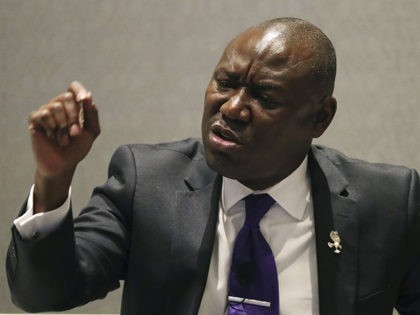 Attorney Benjamin Crump addresses the National Association of Black Journalists, Friday, Aug. 3, 2018, in Detroit. Crump talked on litigating cases of black men killed by police and the social impact. (AP Photo/Carlos Osorio)