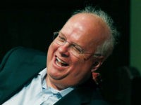 Political strategist Karl Rove, left, laughs with his friend, Pulitzer Prize winning author Jon Meacham, as they discuss the historical progress of politics during the Mississippi Book Festival in Jackson, Miss., Saturday, Aug. 18, 2018. (AP Photo/Rogelio V. Solis)