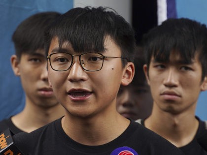 Issac Cheng, vice-chairperson of Demosisto, center, speaks to reporters in Hong Kong Friday, Aug. 30, 2019. Demosisto, a pro-democracy group in Hong Kong, posted on its social media accounts that well-known activist Wong had been pushed into a private car around 7:30 a.m. Friday, Aug. 30, 2019 and was taken …