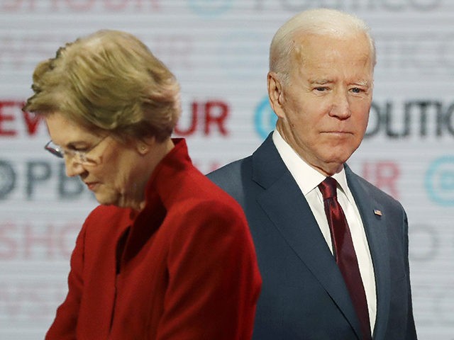 Democratic presidential candidates Sen. Elizabeth Warren, D-Mass., left, and former Vice P