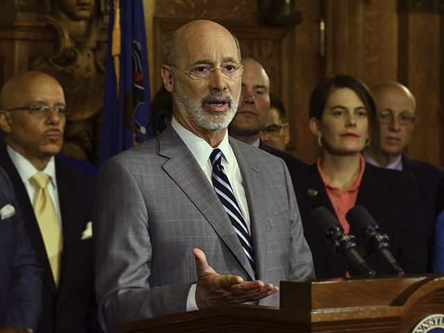 Gov. Tom Wolf speaks at a news conference in his Capitol offices as he unveils a $1.1 billion package intended to help eliminate lead and asbestos contamination in Pennsylvania's schools, homes, day care facilities and public water systems, Wednesday, Jan. 29, 2020 in Harrisburg, Pa. Looking on are Democratic state …