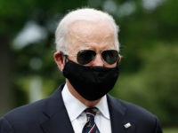 Democratic presidential candidate, former Vice President Joe Biden, with Jill Biden, departs after laying a wreath at the Delaware Memorial Bridge Veterans Memorial Park, Monday, May 25, 2020, in New Castle, Del. (AP Photo/Patrick Semansky)