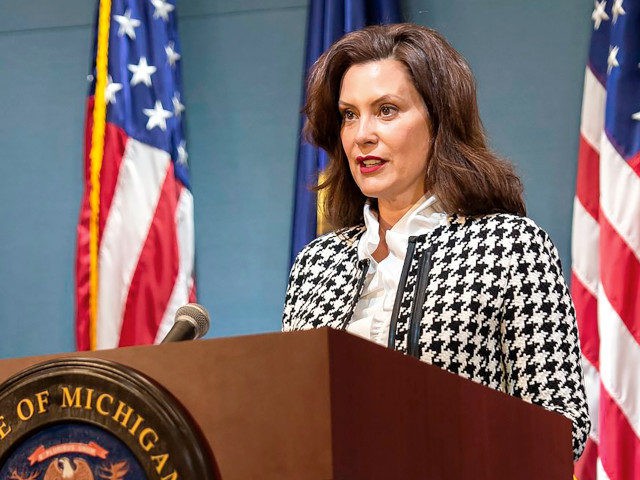 In this photo provided by the Michigan Executive Office of the Governor, Gov. Gretchen Whitmer speaks during a news conference Tuesday, May 26, 2020, in Lansing, Mich. Whitmer announced that people who leave their home for work or those who have coronavirus symptoms can be tested without needing a doctor's …