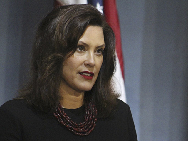 In this photo provided by the Michigan Executive Office of the Governor, Gov. Gretchen Whitmer speaks during a news conference Friday, May 29, 2020, in Lansing, Mich. Whitmer hinted that she will soon reopen more regions of Michigan, expressing optimism as long as the rate of new coronavirus cases continues downward and testing increases. (Michigan Executive Office of the Governor via AP)