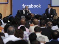 Prime Minister of India Narendra Modi, left, speaks next to Facebook CEO Mark Zuckerberg at Facebook in Menlo Park, Calif., Sunday, Sept. 27, 2015. A rare visit by Indian Prime Minister Narendra Modi this weekend has captivated his extensive fan club in the area and commanded the attention of major …