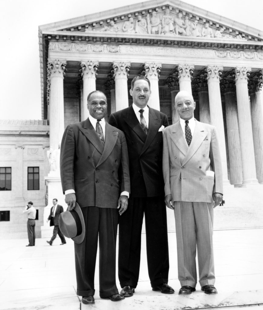 George E.C. Hayes, left, Thurgood Marshall, center, and James M. Nabrit pose outside the U.S. Supreme Court in Washington, D.C. on May 17, 1954. The three lawyers led the fight for abolition of segregation in public schools before the Supreme Court, which ruled today that segregation is unconstitutional. (AP Photo)