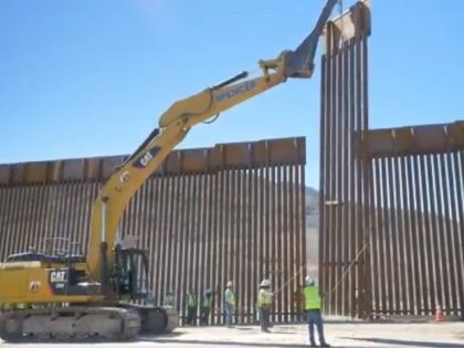 Border Patrol officials announce the completion of a 15-mile section of new border wall in the El Centro Sector. (U.S. Customs and Border Protection video screenshot)