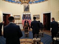 President Donald Trump arrives to speak as meets with front line workers battling the coronavirus, in the Blue Room of the White House, Friday, May 1, 2020, in Washington. (AP Photo/Alex Brandon)