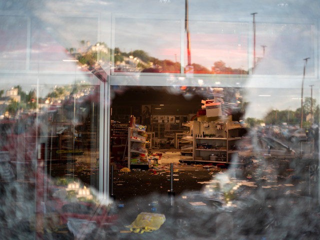 MINNEAPOLIS, MN - MAY 27: A view inside a Target store through a broken window on May 27, 2020 in Minneapolis, Minnesota. Businesses near the 3rd Police Precinct were looted and damaged today as the area has become the site of an ongoing protest after the police killing of George …