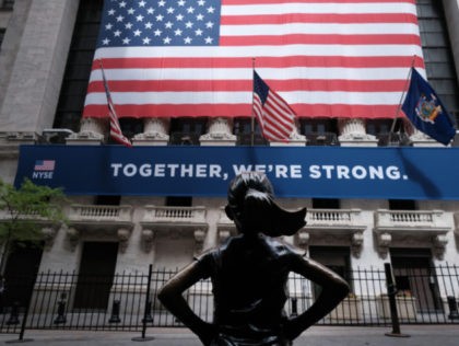 NEW YORK, NEW YORK - MAY 26: The New York Stock Exchange (NYSE) stands in lower Manhattan on the first day that traders are allowed back onto the historic floor of the exchange on May 26, 2020 in New York City. While only a small number of traders will be …