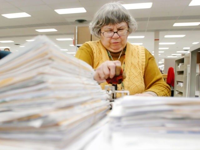 COVINGTON, KY - APRIL 8: Kathleen Malone works on tax returns at the Cincinnati Internal