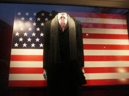 WASHINGTON, DC - JANUARY 17: A store displays an American flag and formal wear ahead of i