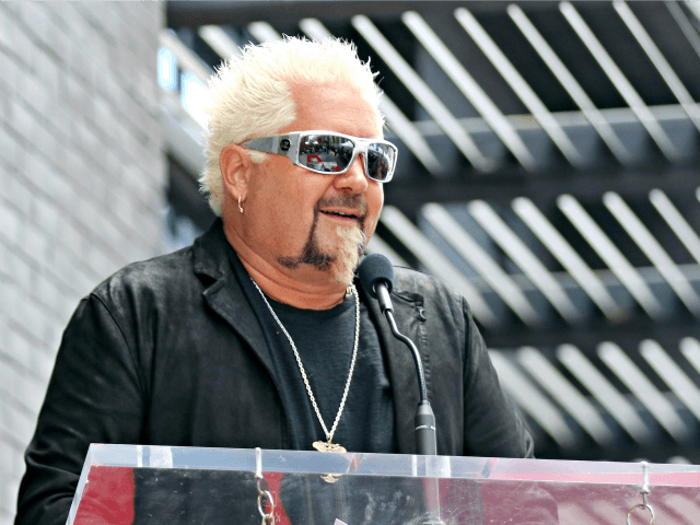 Guy Fieri speaks at a ceremony honoring him with a star at the Hollywood Walk of Fame on W
