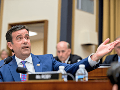 Rep. John Ratcliffe, R-Texas, questions Deputy Attorney General Rod Rosenstein, and FBI Director Christopher Wray, as they appear before a House Judiciary Committee hearing on Capitol Hill in Washington, Thursday, June 28, 2018, on Justice Department and FBI actions around the 2016 presidential election. (AP Photo/Andrew Harnik)