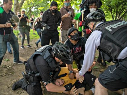 WASHINGTON, DC - MAY 29: Demonstrators clash with police during a protest in response to the police killing of George Floyd in Lafayette Square Park on May 29, 2020 in Washington, DC. Across country, protests against Floyd's death have set off days and nights of rage as the most recent …