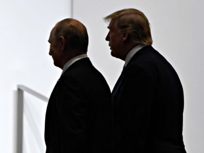 FILE - In this June 28, 2019, file photo, President Donald Trump and Russian President Vladimir Putin walk to participate in a group photo at the G20 summit in Osaka, Japan. The Trump administration is notifying international partners that it is pulling out of a treaty that permits 30-plus nations …