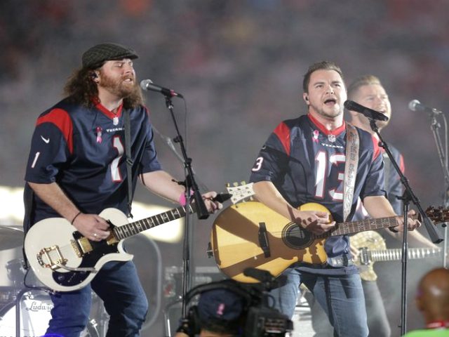 FILE - This Oct. 9, 2014 file photo shows The Eli Young Band performing during halftime of