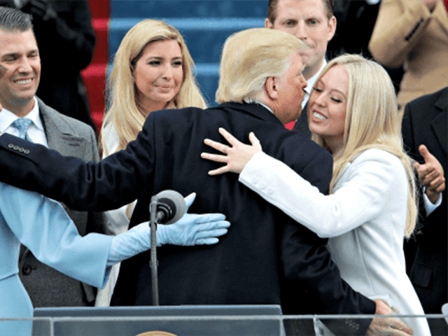 WASHINGTON, DC - JANUARY 20: President Donald Trump kisses his daughter Tiffany Trump afte