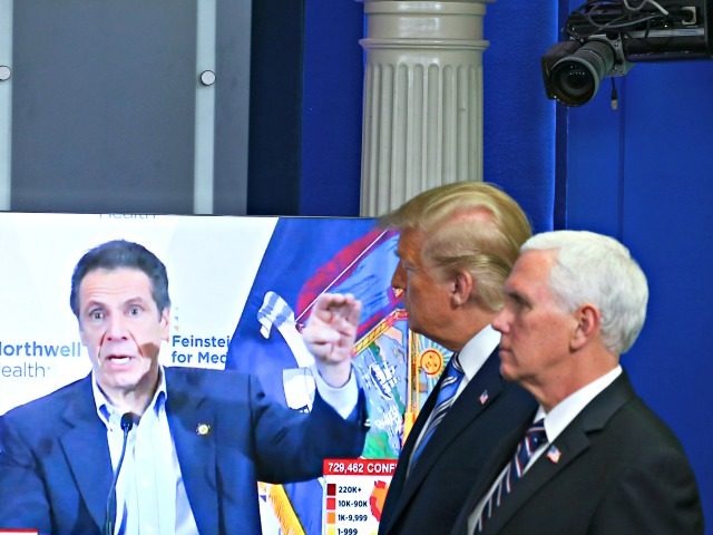 WASHINGTON, DC - APRIL 19: U.S. President Donald Trump and Vice President Mike Pence watch a TV clip of New York state Gov. Andrew Cuomo at the daily coronavirus briefing at the White House on April 19, 2020 in Washington, DC. New York state will begin the nation's most aggressive …