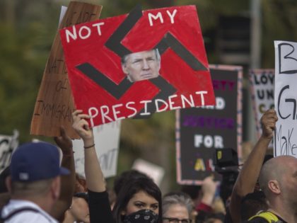Trump swastika (David McNew / Getty)