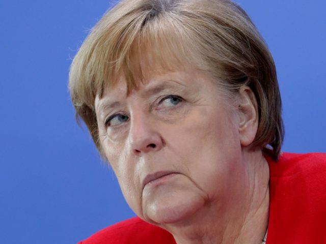 German Chancellor Angela Merkel attends a press conference in Berlin, Germany, Wednesday,