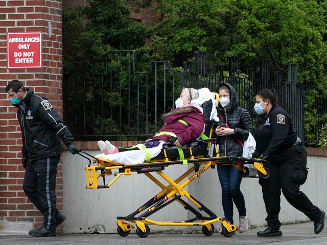A patient is moved by an ambulance team at NewYorkâ€“Presbyterian Brooklyn Methodist Hospital, Wednesday, May 6, 2020, in New York during the coronavirus pandemic. The great majority of people newly hospitalized with the coronavirus in New York are either retired or unemployed and were avoiding public transit, according to a …