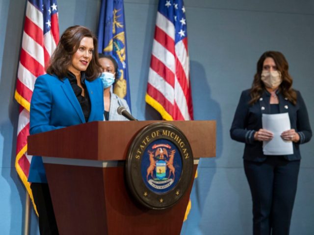 In a pool photo provided by the Michigan Office of the Governor, Michigan Gov. Gretchen Whitmer addresses the state during a speech in Lansing, Mich., Monday, May 11, 2020. Protests against Whitmer have erupted in recent weeks as she has put in place restrictions on businesses and Michigan residents, including …