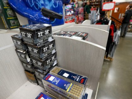 Rimfire .22 caliber ammunition is all that is stocked on customer accessible shelves as employees retrieve other ammunition from behind counters, Wednesday, March 25, 2020, at Duke's Sport Shop in New Castle, Pa. (AP Photo/Keith Srakocic)