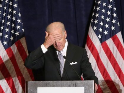 WASHINGTON, DC - FEBRUARY 27: U.S. Vice President Joe Biden feigns disappointment while de