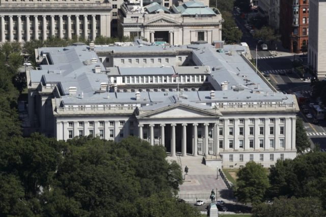 This Sept. 18, 2019 photo shows the U.S. Treasury Department building viewed from the Washington Monument in Washington. The Treasury Department says it will need to borrow a record $2.99 trillion during the current April-June quarter to cover the cost of various rescue efforts dealing with the coronavirus pandemic. Treasury …