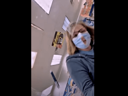 Kentucky woman cuts hole in mask to make it ‘easier to breathe’