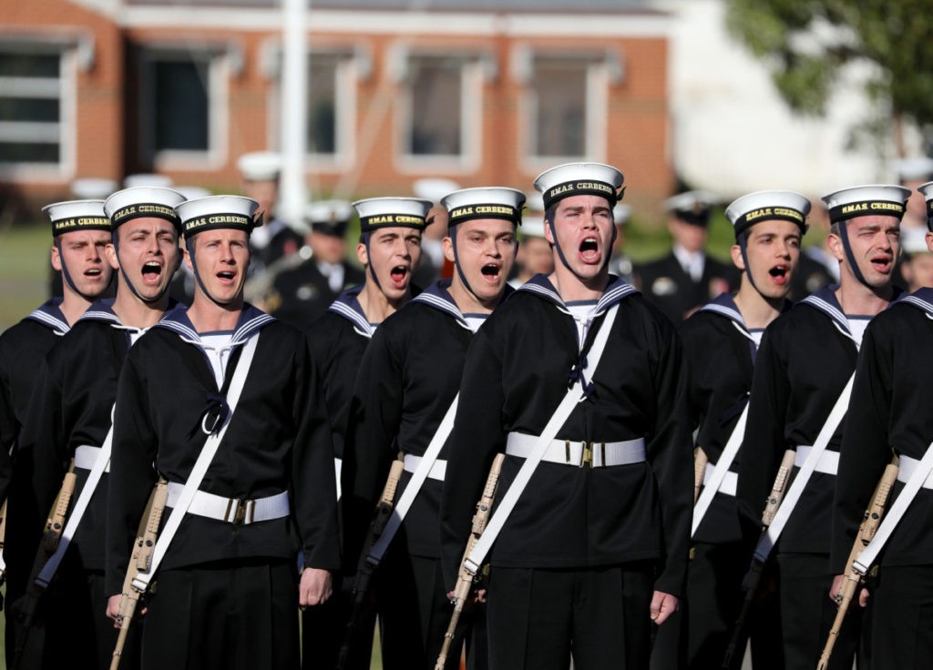 Members of General Entry 363 Rogers Division reciting the words 'honour, honesty, courage, integrity, loyalty during their graduation parade held at Recruit School, HMAS Cerberus, Victoria. The Reviewing Officer for the graduation parade was Warrant Officer of The Navy, Warrant Officer Gary Wight. (POIS Nina Fogliani/Royal Australian Navy)