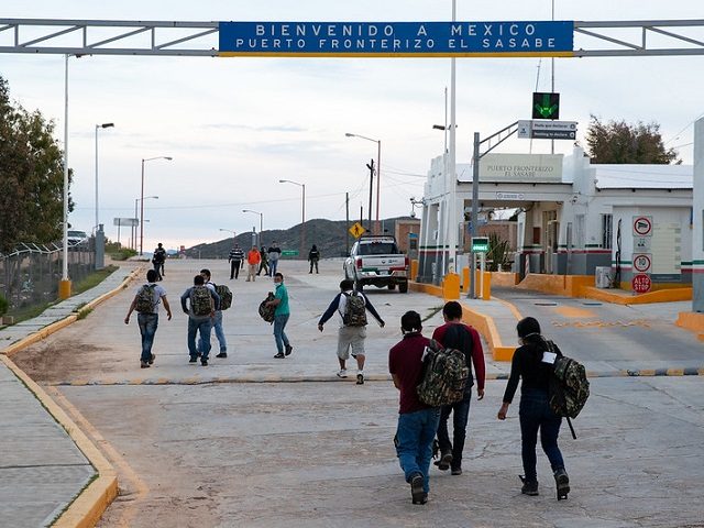 Border Patrol agents expel apprehended migrants to Mexico under Title 42 coronavirus protection protocols. (CBP File Photo: Jerry Glaser)
