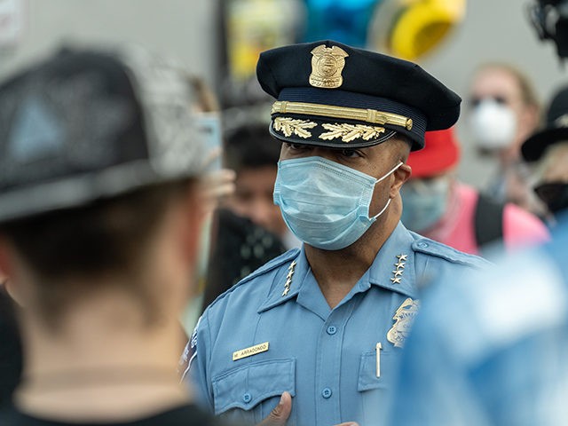 Minneapolis Police Chief Medaria Arradondo speaks with protesters at the location of Georg