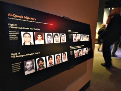 A display at the National September 11 Memorial Museum shows the 9/11 hijackers. A new lawsuit details Saudi officials' alleged role in aiding the 19 hijackers who killed nearly 3,000 people. (STAN HONDA/AFP/Getty Images)