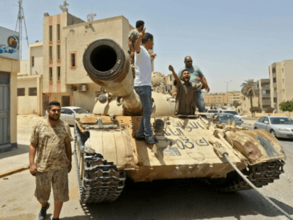 Forces of Libya's UN-recognised unity government patrol the town of Tarhuna, southeast of