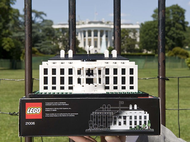 Adam Reed Tucker, 38, who combined his childhood love of building with his career as an architect to develop the LEGO Architecture series of replica models showcases his newest creation, The White House on Friday, July 2, 2010 during the opening of his show 