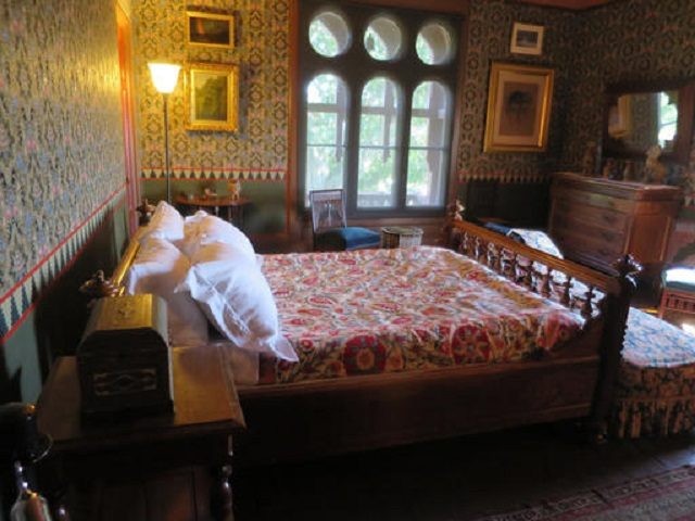 In this Aug. 19, 2016 photo, the master bedroom in the exotic mansion at Olana, the propertywhere artist Frederic Edwin Church and his wife Isabel lived, is seen on a tour of the house in Greenport, N.Y. Autumn is the perfect season to visit Olana, as well as the home …