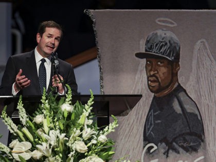 Steve Wells, senior pastor of South Main Baptist Church, speaks during the funeral for Geo