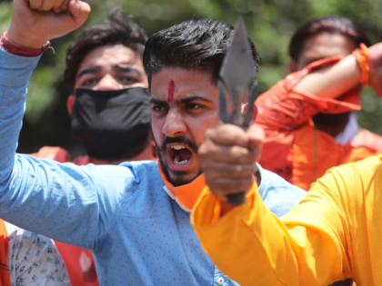 Activists of Rashtriya Bajrang Dal shout slogans during a protest against the Chinese gove