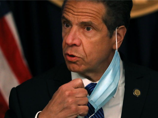 New York Governor Andrew Cuomo arrives with a face mask at a news conference on May 21, 20