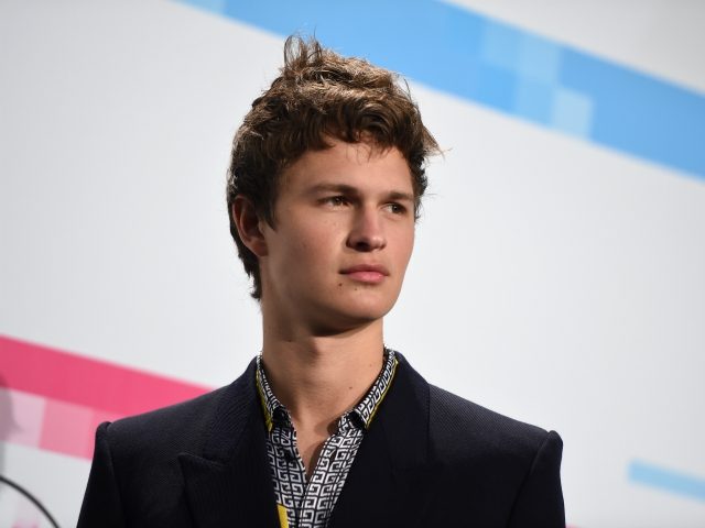 Actor Ansel Elgort poses in the press room at the 2017 American Music Awards, on November