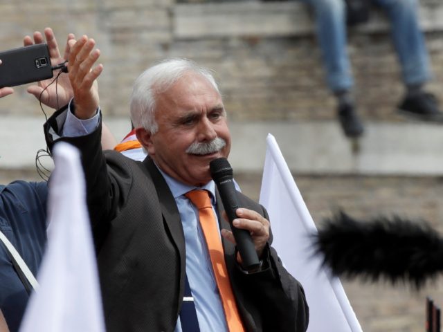 Leader of the Orange Vests movement, Antonio Pappalardo, addresses a rally in Rome, Tuesday, June 2, 2020. Hundreds of protesters shunning masks gathered in Rome's Piazza del Popolo on Tuesday to demonstrate against the government measures taken to stop the spread of coronavirus. The so-called Orange Vests, a marginal political …