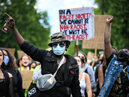 LONDON, UNITED KINGDOM - JUNE 21: Protestors take part in a march towards Parliament Square on June 21, 2020 in London, United Kingdom. Black Lives Matter protests are continuing across the UK following the death of African American George Floyd at the hands of police officers in Minneapolis on May …