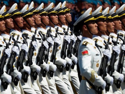 Soldiers of China's People's Liberation Army march on Red Square during a military parade,