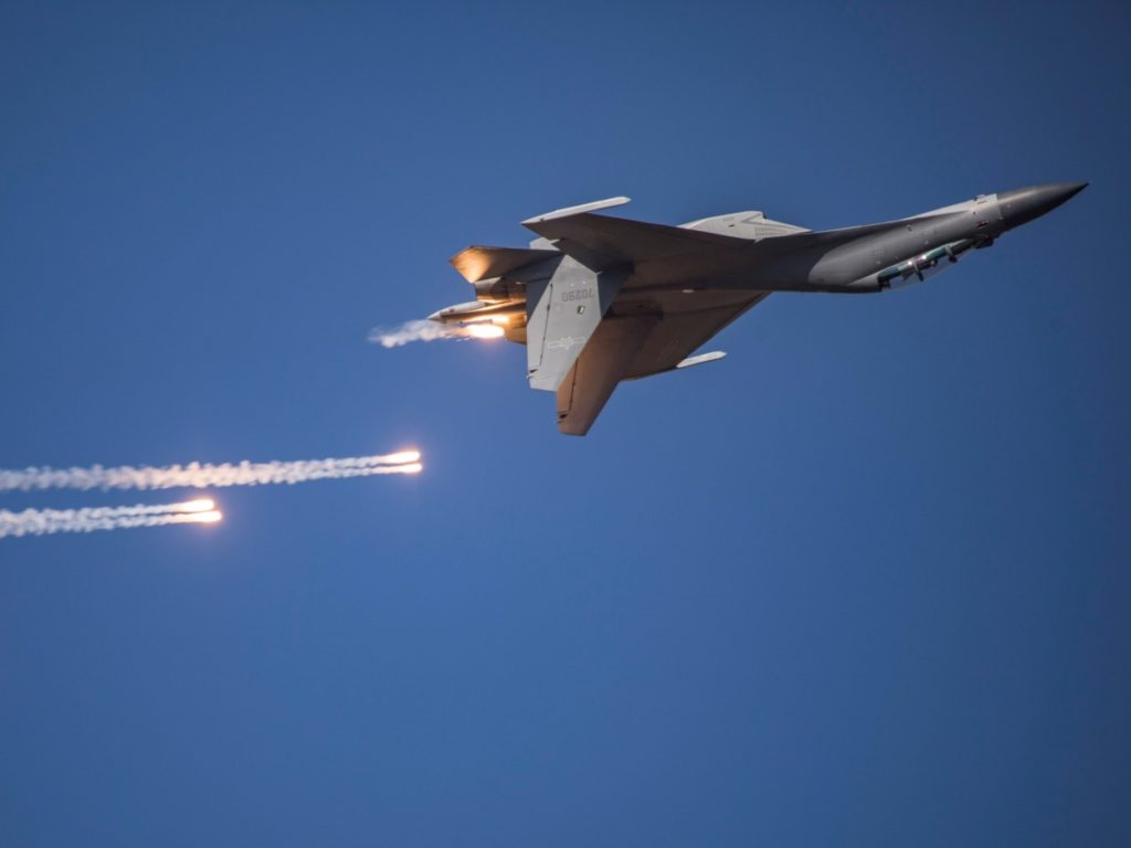 This photo taken on October 17, 2019 shows a J-16 fighter jet performing in the sky during the Chinese People's Liberation Army Air Force Aviation Open Day in Changchun in China's northeastern Jilin province, to mark the 70th anniversary of the founding of the Chinese People's Liberation Army Air Force. (Photo by STR / AFP) / China OUT (Photo by STR/AFP via Getty Images)