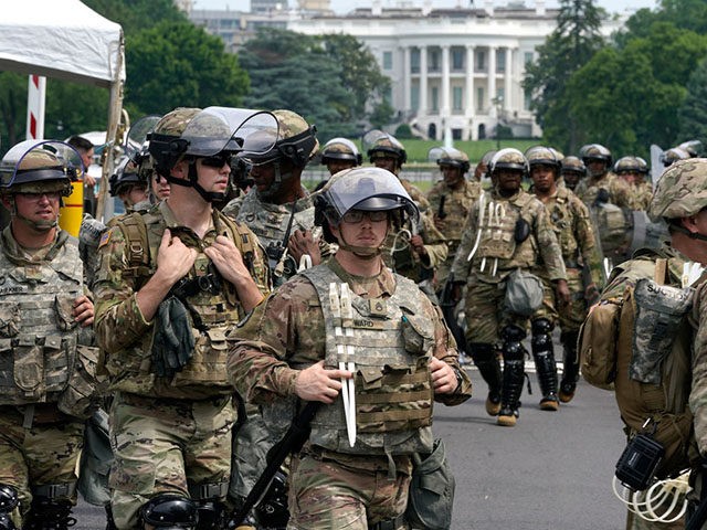 WASHINGTON, DC - JUNE 06: National Guard members deploy near the White House as peaceful p