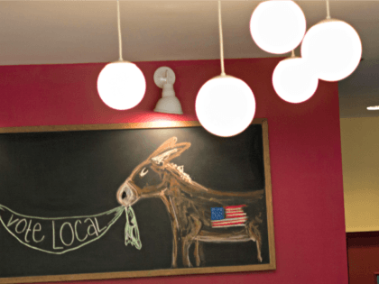 A chalkboard at the Harvest Moon Grille shows a the Democrat's symbol of a donkey on September 1, 2012 in Charlotte, North Carolina. Preparations for the 2012 Democratic National Convention have begun around Charlotte where the the party is expected to nominate US President Barack Obama to run for a …
